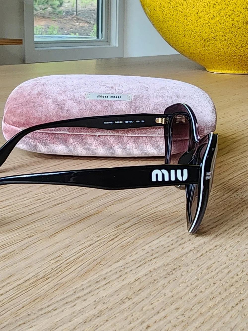 Miu Miu Women's Cat-Eye Black Sunglasses With White Star Pattern